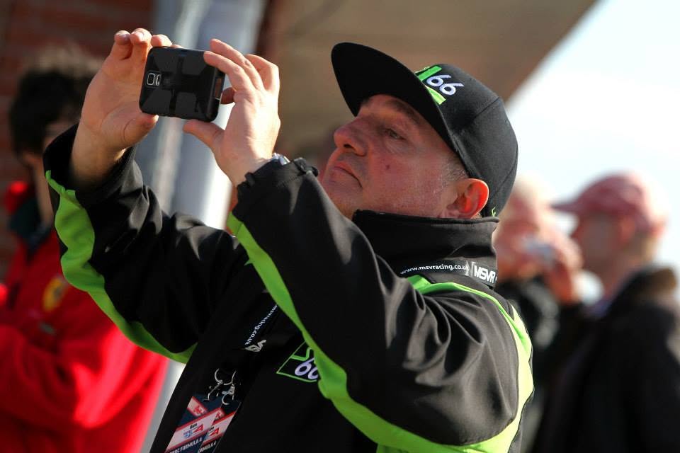 Matteo Lanzetti in Lanzetti Racing team kit photographing Sebastian's car from the paddock